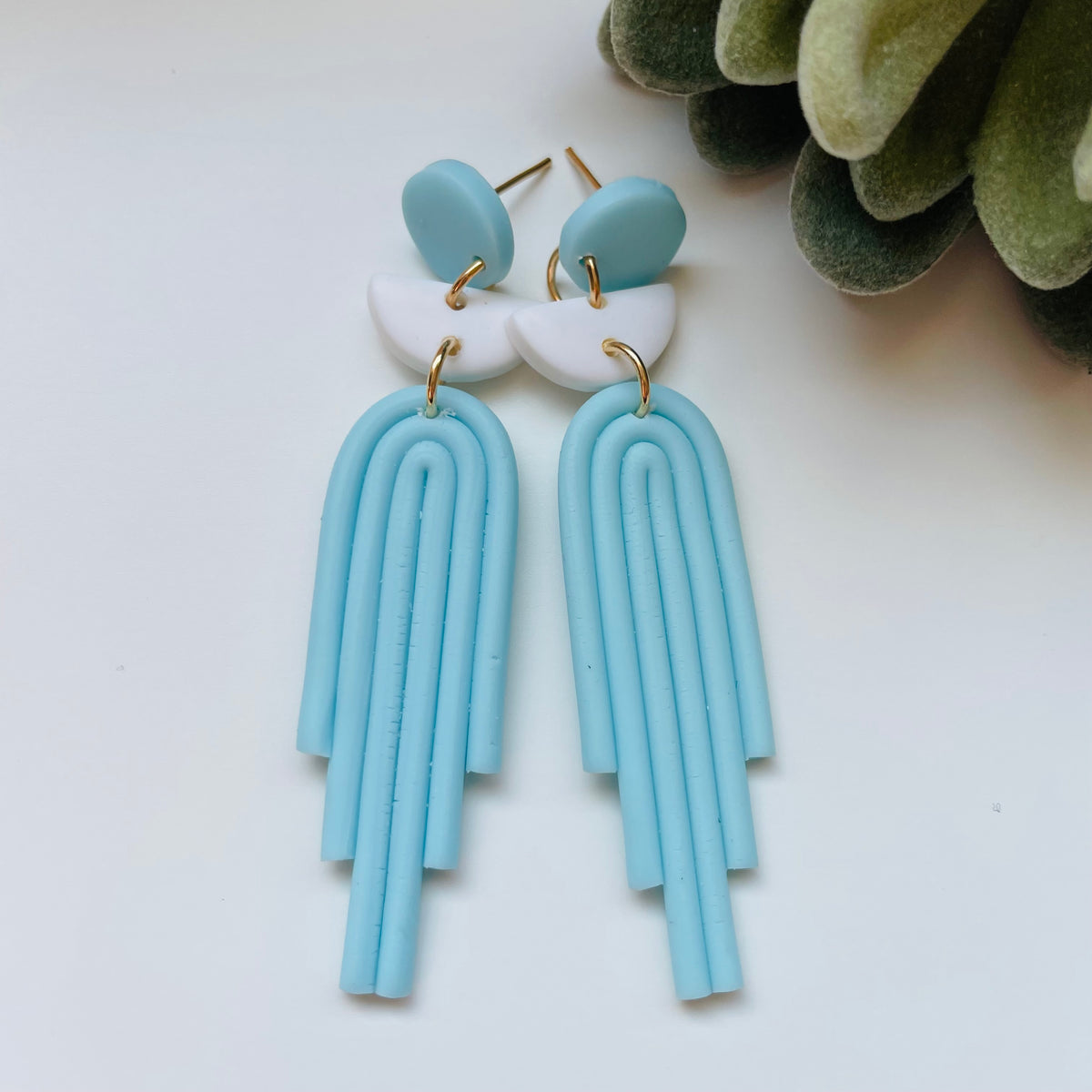 Powder blue tassel on sale earrings